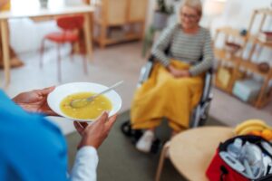 Senior patient receiving comforting end-of-life care in Portland, OR